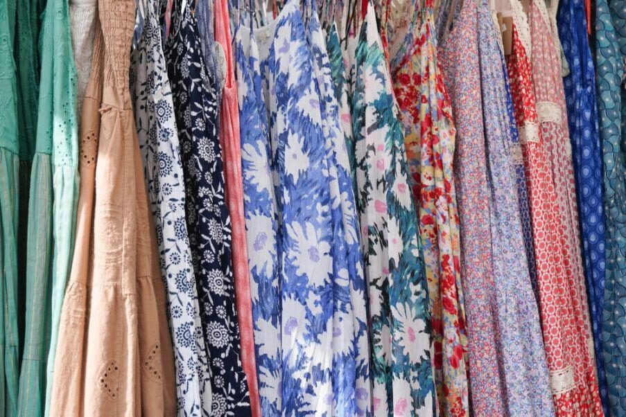 colorful-women-clothes-hangers-store-background.jpg
